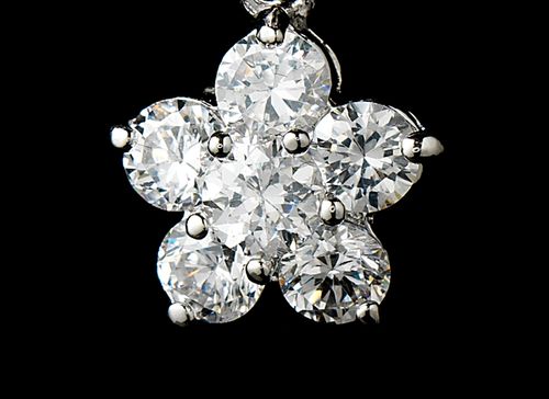 Diamond flower-shaped pendant on a black background